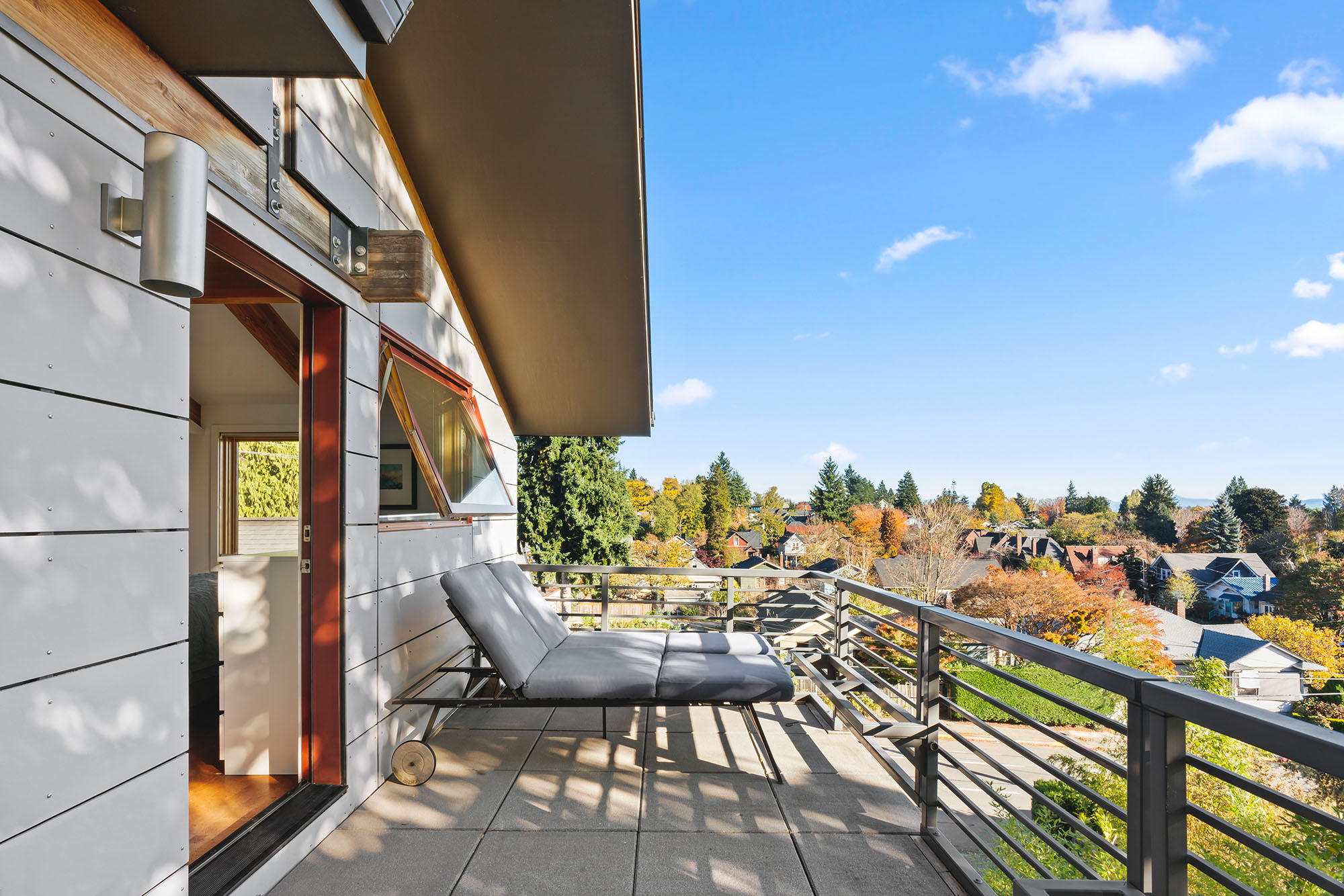 Upper deck with neighborhood and mountain views